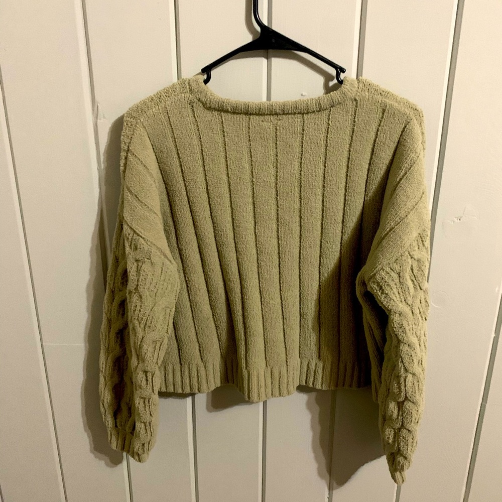 Sage green crewneck sweater with unique patterns